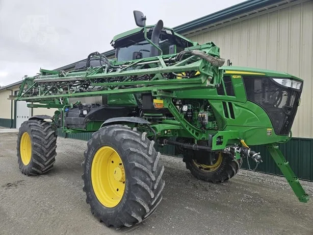 JOHN DEERE 412R — foto 1 de 40